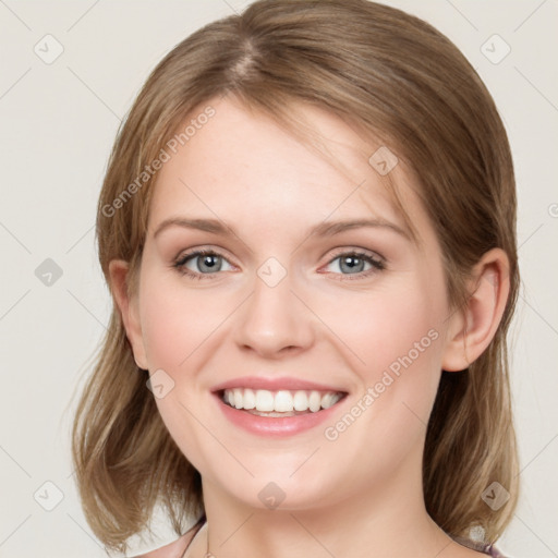 Joyful white young-adult female with medium  brown hair and green eyes