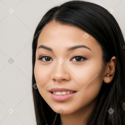 Joyful latino young-adult female with long  black hair and brown eyes