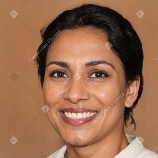 Joyful latino young-adult female with medium  brown hair and brown eyes