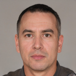 Neutral white adult male with short  brown hair and brown eyes
