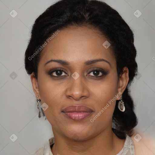 Joyful black young-adult female with short  black hair and brown eyes