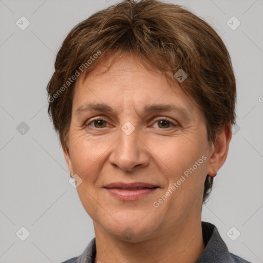 Joyful white adult female with short  brown hair and brown eyes