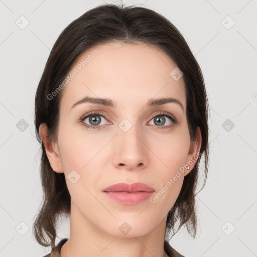 Neutral white young-adult female with medium  brown hair and grey eyes