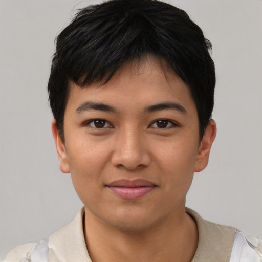 Joyful asian young-adult female with short  black hair and brown eyes