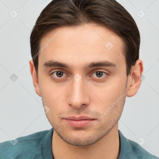 Neutral white young-adult male with short  brown hair and brown eyes