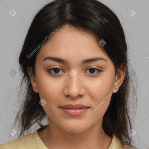 Joyful latino young-adult female with medium  brown hair and brown eyes