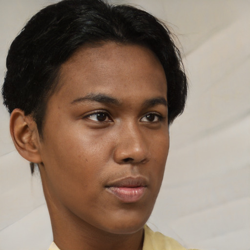 Neutral black young-adult female with short  brown hair and brown eyes