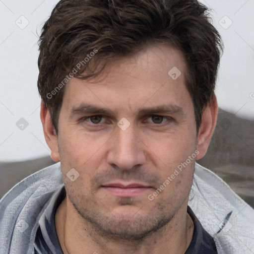 Neutral white adult male with short  brown hair and brown eyes