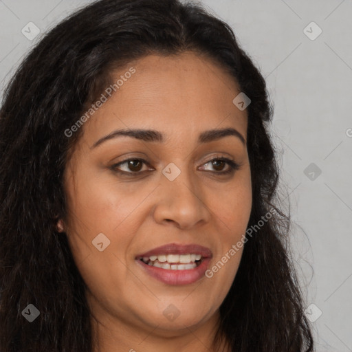 Joyful latino young-adult female with long  brown hair and brown eyes