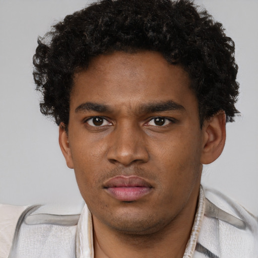 Neutral black young-adult male with short  brown hair and brown eyes