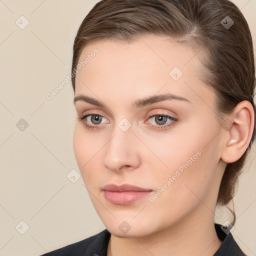 Neutral white young-adult female with medium  brown hair and brown eyes