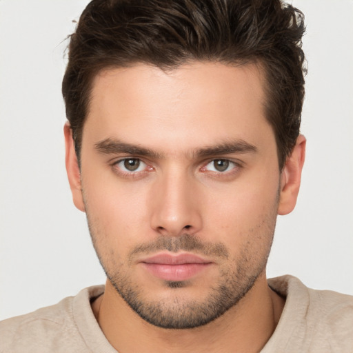 Neutral white young-adult male with short  brown hair and brown eyes