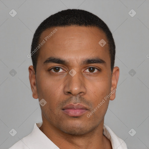 Neutral latino young-adult male with short  black hair and brown eyes