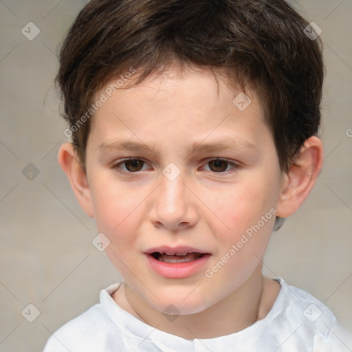 Joyful white child male with short  brown hair and brown eyes