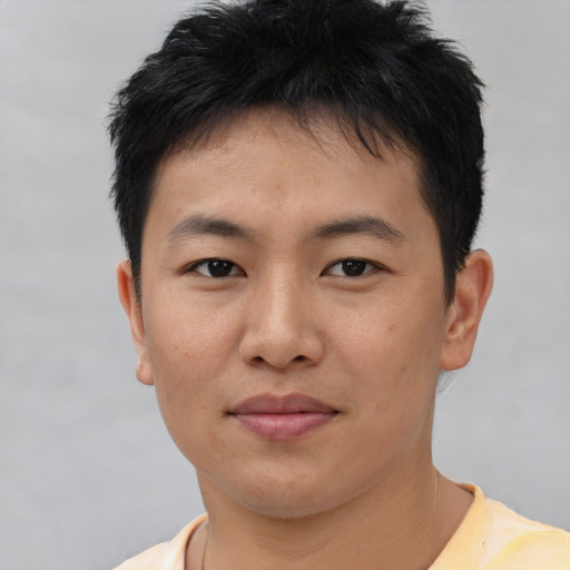 Neutral asian young-adult male with short  black hair and brown eyes