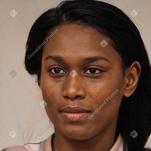 Joyful black young-adult female with medium  black hair and brown eyes