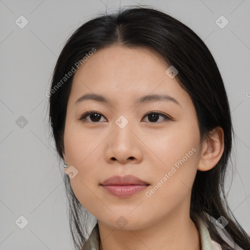 Joyful asian young-adult female with medium  brown hair and brown eyes