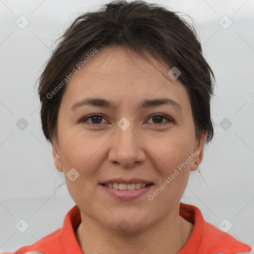 Joyful white adult female with medium  brown hair and brown eyes