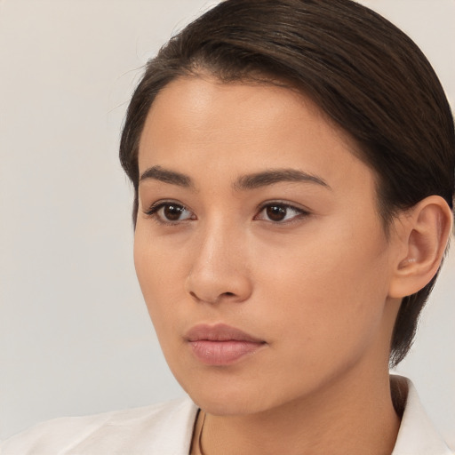 Neutral white young-adult female with short  brown hair and brown eyes