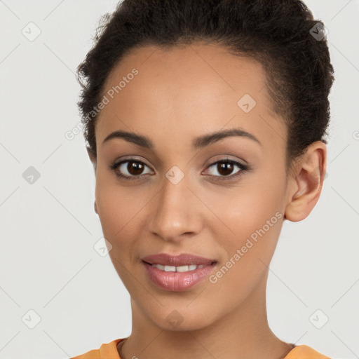 Joyful latino young-adult female with short  brown hair and brown eyes