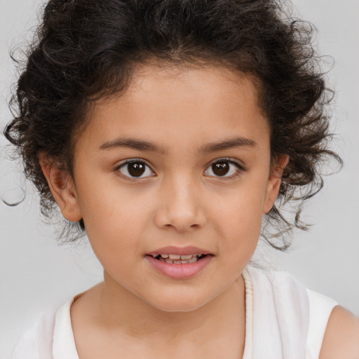 Joyful white child female with medium  brown hair and brown eyes