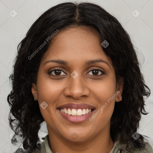 Joyful black young-adult female with medium  brown hair and brown eyes