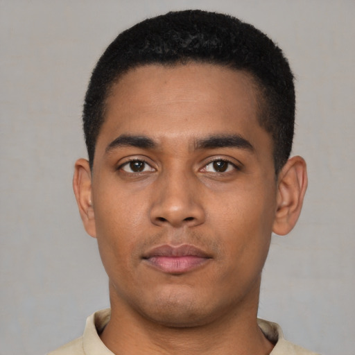 Neutral latino young-adult male with short  black hair and brown eyes