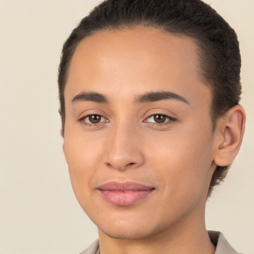 Joyful white young-adult female with short  brown hair and brown eyes