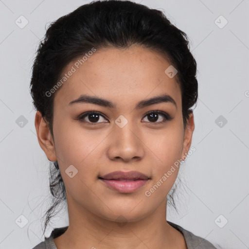 Joyful latino young-adult female with short  brown hair and brown eyes