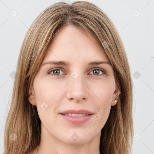 Joyful white young-adult female with long  brown hair and grey eyes