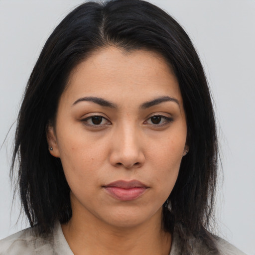 Neutral asian young-adult female with medium  brown hair and brown eyes