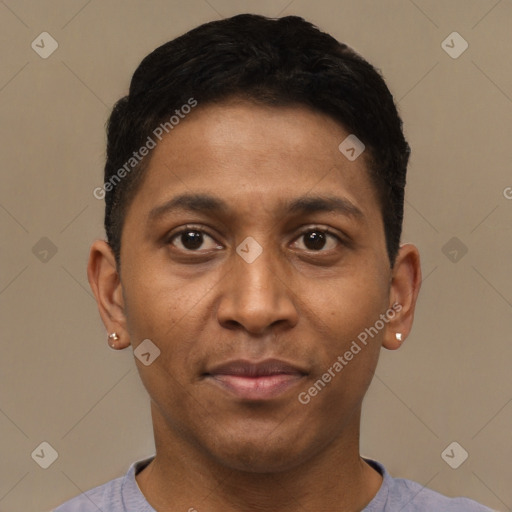 Joyful latino young-adult male with short  black hair and brown eyes