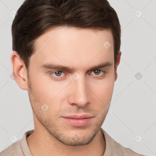 Neutral white young-adult male with short  brown hair and brown eyes