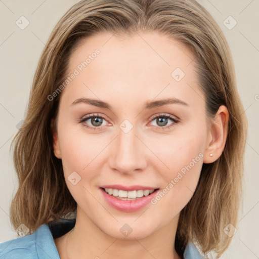 Joyful white young-adult female with medium  brown hair and blue eyes