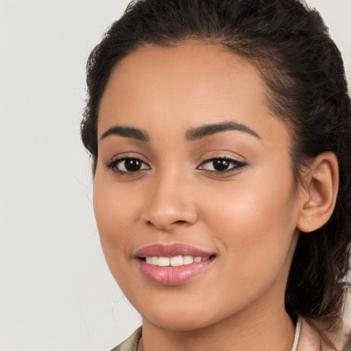 Joyful white young-adult female with long  brown hair and brown eyes