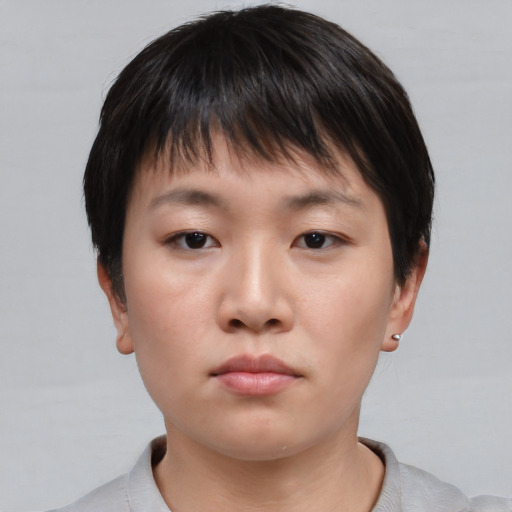 Neutral asian young-adult male with short  brown hair and brown eyes