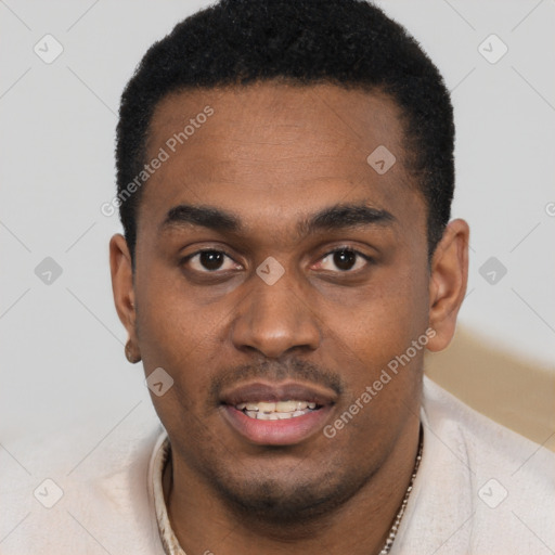 Joyful black young-adult male with short  black hair and brown eyes