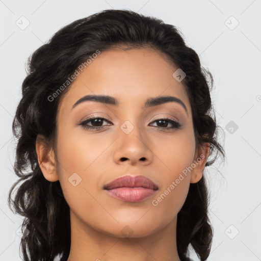 Joyful latino young-adult female with long  brown hair and brown eyes