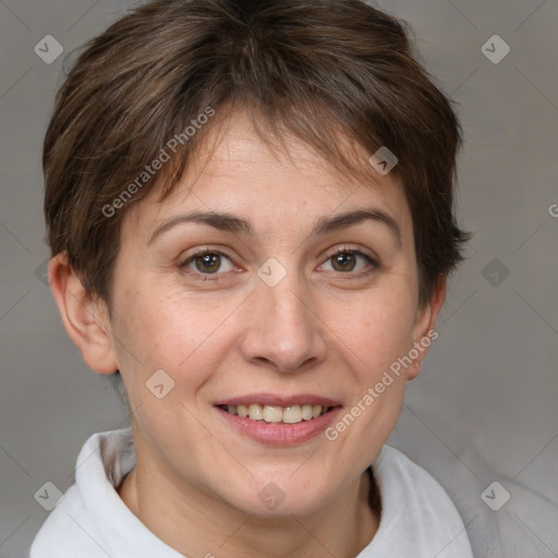 Joyful white adult female with short  brown hair and brown eyes