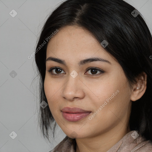 Joyful asian young-adult female with medium  black hair and brown eyes