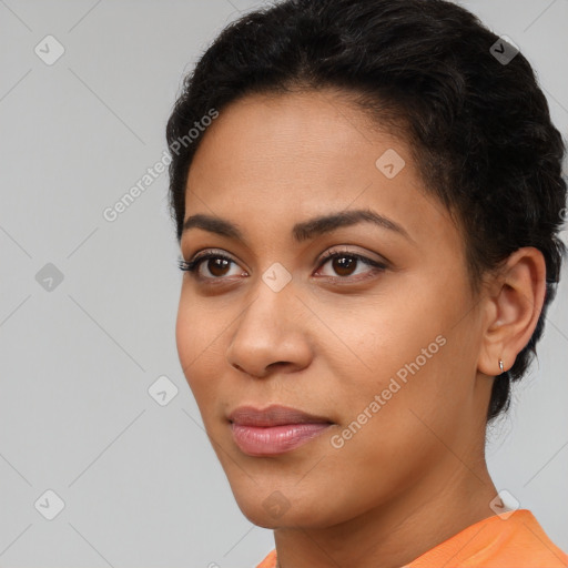 Joyful latino young-adult female with short  brown hair and brown eyes