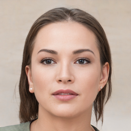 Neutral white young-adult female with medium  brown hair and brown eyes