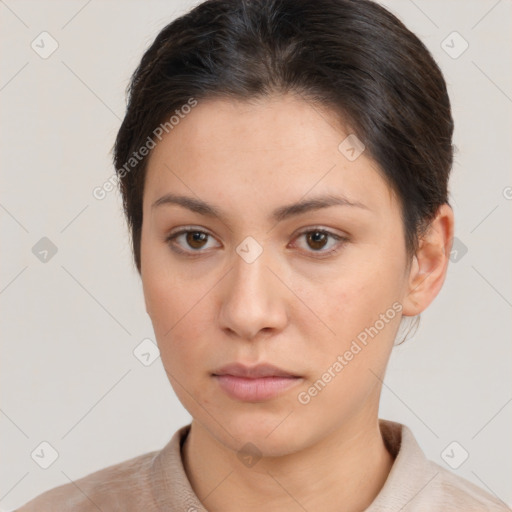 Neutral white young-adult female with short  brown hair and brown eyes