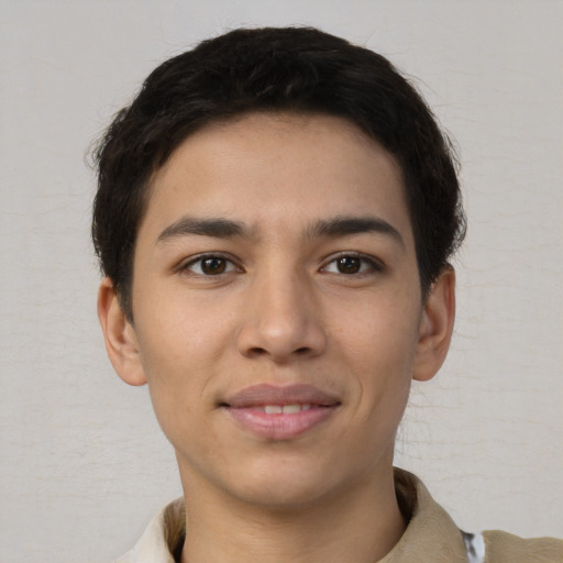 Joyful asian young-adult male with short  brown hair and brown eyes