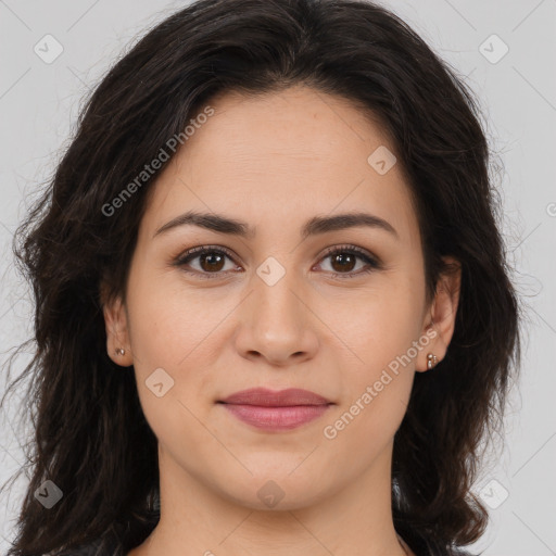 Joyful white young-adult female with long  brown hair and brown eyes