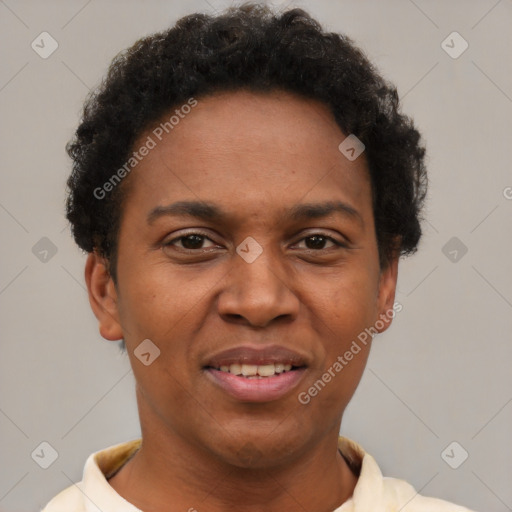 Joyful black adult female with short  brown hair and brown eyes