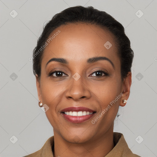 Joyful latino young-adult female with short  black hair and brown eyes