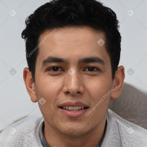 Joyful latino young-adult male with short  black hair and brown eyes