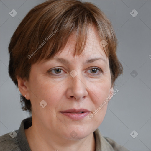 Joyful white adult female with medium  brown hair and grey eyes