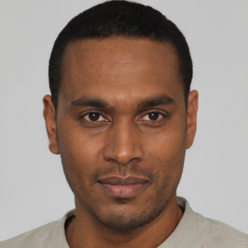 Neutral black young-adult male with short  black hair and brown eyes